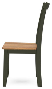 Ashley Furniture Gesthaven dining room set with a wooden table and matching chairs in a cozy dining space.