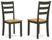 Ashley Furniture Gesthaven dining room set with a table and matching chairs, shown from an angled view.