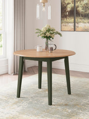 Ashley Furniture Gesthaven dining room set with a wooden table and six upholstered chairs in a warm finish.