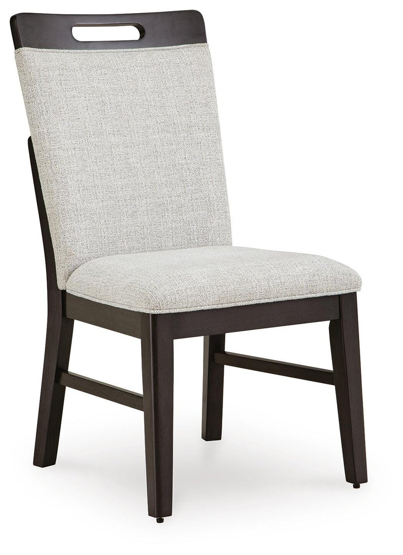 Ashley Furniture Neymorton dining room set with a wooden table and matching chairs, shown from an angled view.