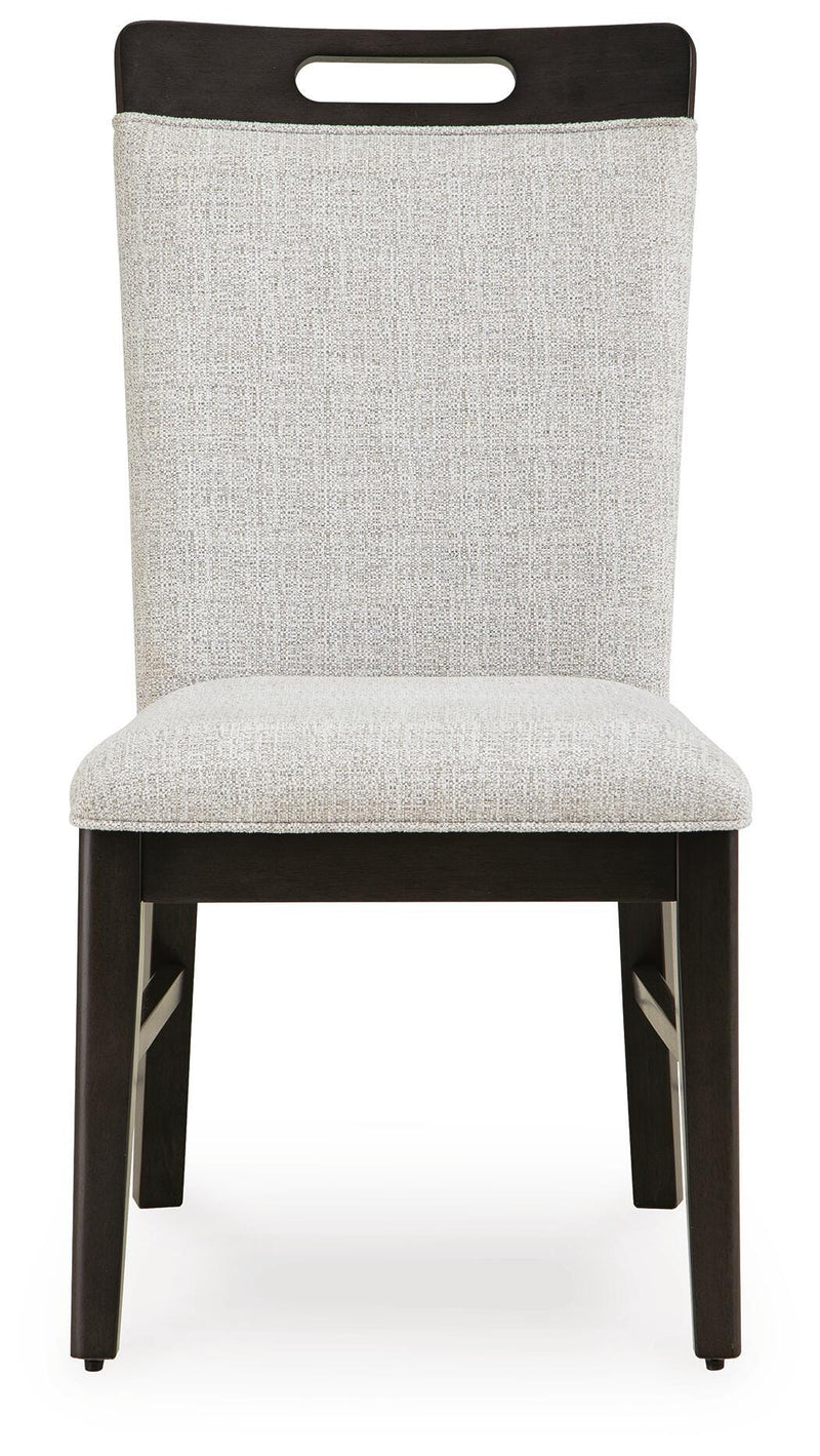 Ashley Furniture Neymorton dining room set with a wooden table and matching chairs, showcasing a classic design and rich finish.