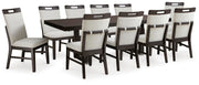Ashley Furniture Neymorton dining room set with a rectangular table and six upholstered chairs, shown in a modern dining space.