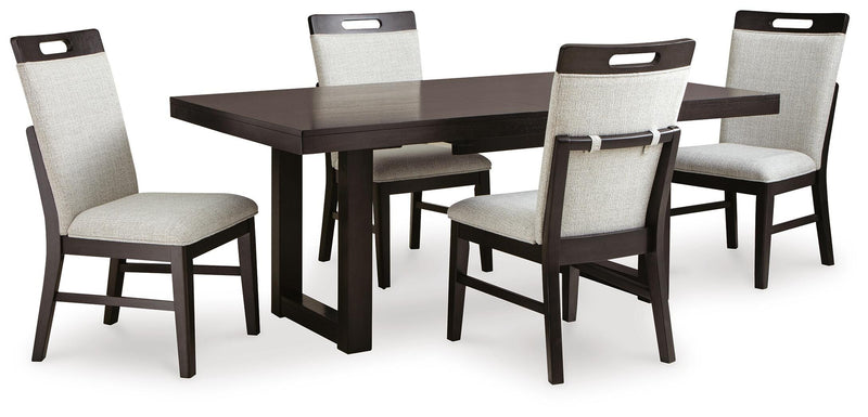 Ashley Furniture Neymorton dining room set with a wooden table and matching chairs, shown in a modern dining space.