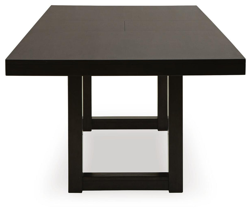 Ashley Furniture Neymorton dining room set with a wooden table and six upholstered chairs, shown in a modern dining space.