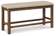 Ashley Furniture Moriville counter height dining set with four chairs and a rectangular table in a modern dining room setting.
