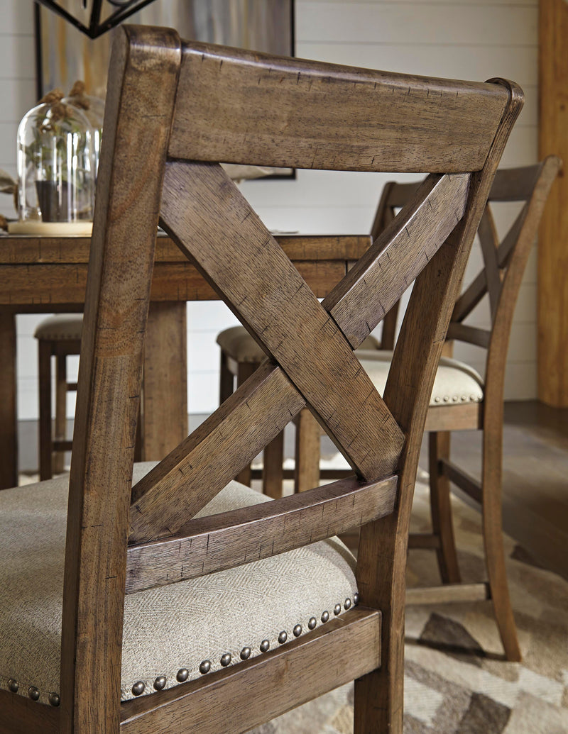 Ashley Furniture Moriville counter height dining set with wooden table and six matching chairs in a modern dining room setting.