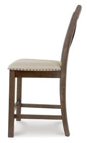 Ashley Furniture Moriville counter height dining set with a table and matching chairs in a modern dining room setting.