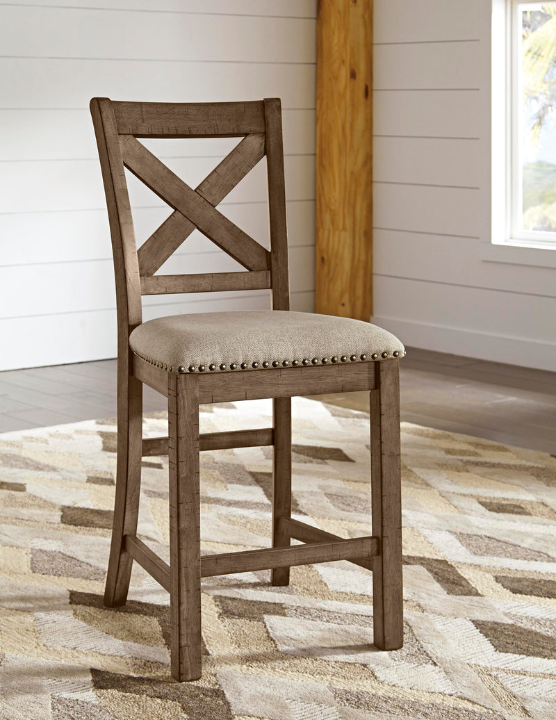 Moriville counter height dining set by Ashley Furniture with a wooden table and matching chairs, ideal for modern dining rooms.