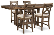 Ashley Furniture Moriville counter height dining set with a wooden table and matching chairs in a modern dining room style.