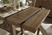Ashley Furniture Moriville counter height dining set with a table and chairs in a modern dining room setting.