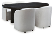 Ashley Furniture Rowanbeck dining room set with a table and chairs in a modern design, shown in a stylish dining space.