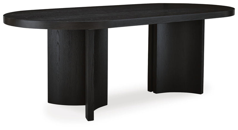 Ashley Furniture Rowanbeck dining room set with a rectangular table and six upholstered chairs, viewed from an angled perspective.