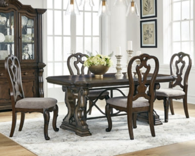 Ashley Furniture Maylee dining room set with a table and six upholstered chairs, shown in a modern dining room setting.