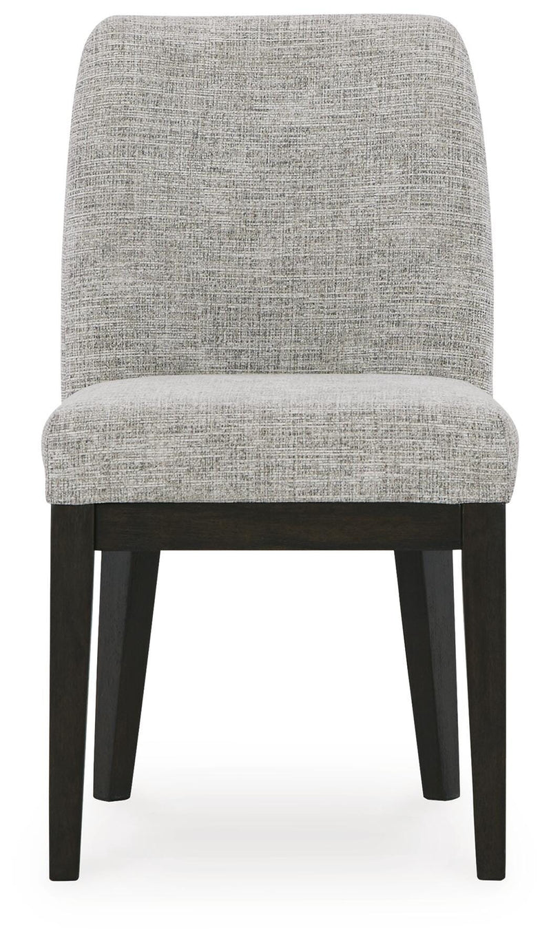 Ashley Furniture Burkhaus dining room set with a wooden table and matching chairs, shown from a head-on view.