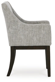 Ashley Furniture Burkhaus dining room set with a rectangular table and six upholstered chairs in a modern wood finish.
