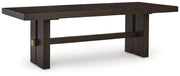 Ashley Furniture Burkhaus dining room set with a table and six chairs, shown from an angled view in a modern dining space.