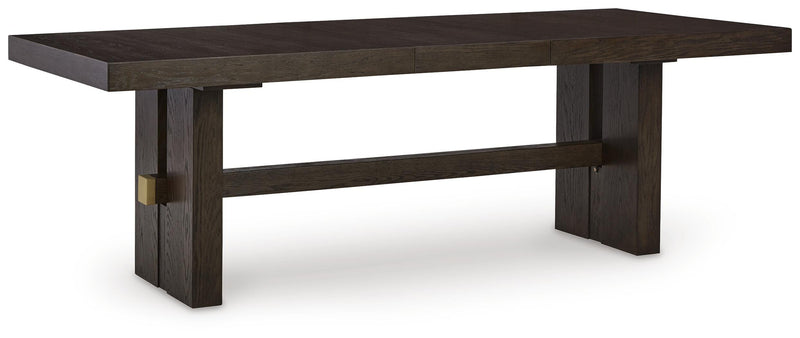 Ashley Furniture Burkhaus dining room set with a table and six chairs, shown from an angled view in a modern dining space.