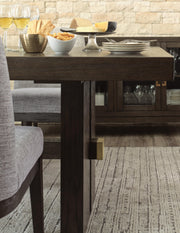 Ashley Furniture Burkhaus dining room set with a wooden table and matching chairs, shown in a detailed base view.
