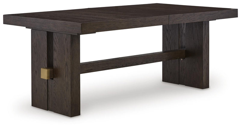 Ashley Furniture Burkhaus dining room set with a wooden table and six matching chairs, shown from an angled side view.