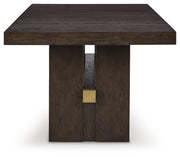 Ashley Furniture Burkhaus dining room set with a wooden table and matching chairs, shown in a well-lit dining space.