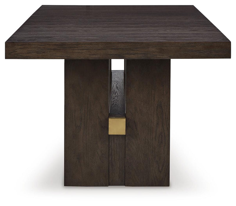 Ashley Furniture Burkhaus dining room set with a wooden table and matching chairs, shown in a well-lit dining space.