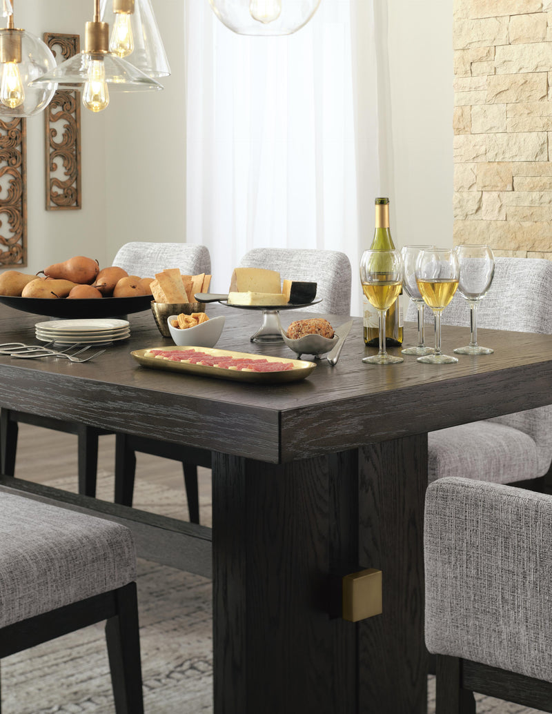 Close-up of Ashley Furniture Burkhaus dining room set table top with intricate wood grain and polished finish.