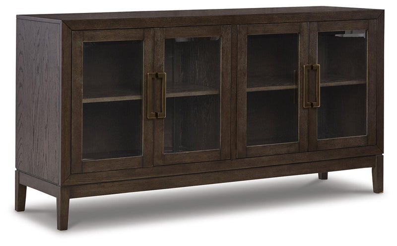Ashley Furniture Burkhaus dining room set with a round table and six upholstered chairs, shown from an angled view.