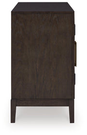 Ashley Furniture Burkhaus dining room set with a wooden table and matching chairs in a modern dining space.
