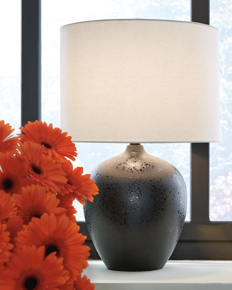 Ashley Furniture Ladstow Lamp Set featuring two stylish table lamps with neutral shades and wood accents.