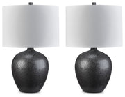 Ashley Furniture Ladstow table lamp set with two modern lamps featuring black bases and white fabric shades.