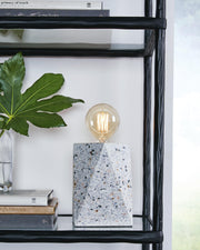 Ashley Furniture Maywick table lamp set with two matching lamps featuring neutral fabric shades and wooden bases.