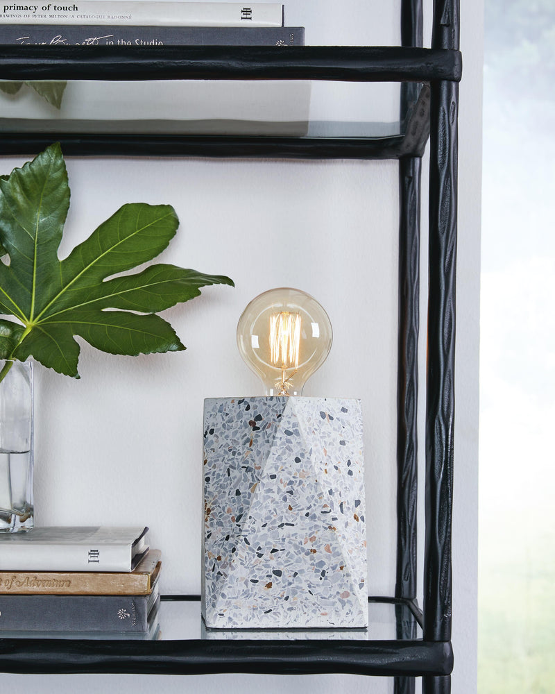 Ashley Furniture Maywick table lamp set with two matching lamps featuring neutral fabric shades and wooden bases.
