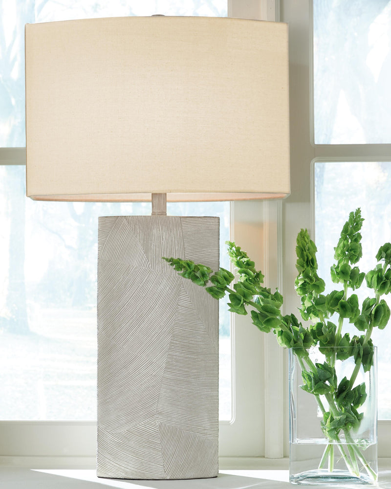 Ashley Furniture Bradard Lamp Set featuring two modern table lamps with fabric shades and sleek bases.