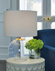 Ashley Furniture Samder table lamp set with two modern ceramic lamps featuring fabric shades and brushed metal bases.
