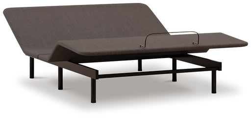 Adjustable base head and foot section in a modern design, showing the Ashley Furniture model with customizable positioning.
