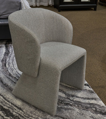 Ashley Furniture Darcyjo Dining Arm Chair showing a plush upholstered seat and wooden armrests in a modern design