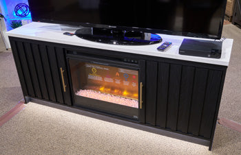 Ashley Furniture Cadmori 63-inch TV stand entertainment center with open shelves and storage cabinets in a modern design.