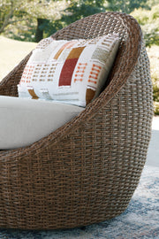 Close-up of Ashley Furniture's double point outdoor seating set, showing detailed view of the outdoor chairs and woven design.