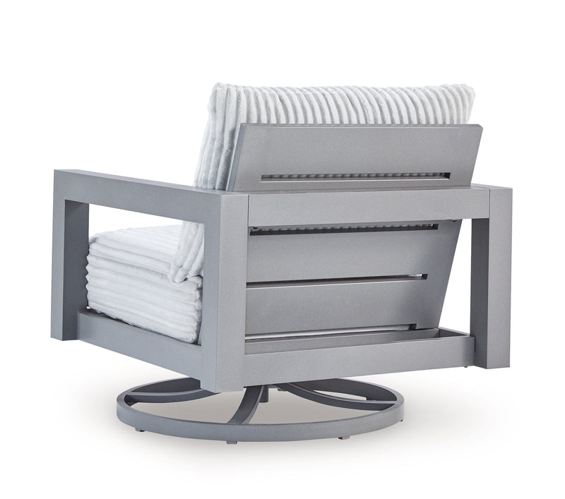 Outdoor table set from Ashley Furniture's Hurley Park Outdoor Package, featuring a sturdy table and matching chairs.