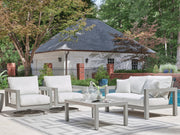 Ashley Furniture Hurley Park outdoor table set with a sturdy table and matching chairs, ideal for garden or patio use