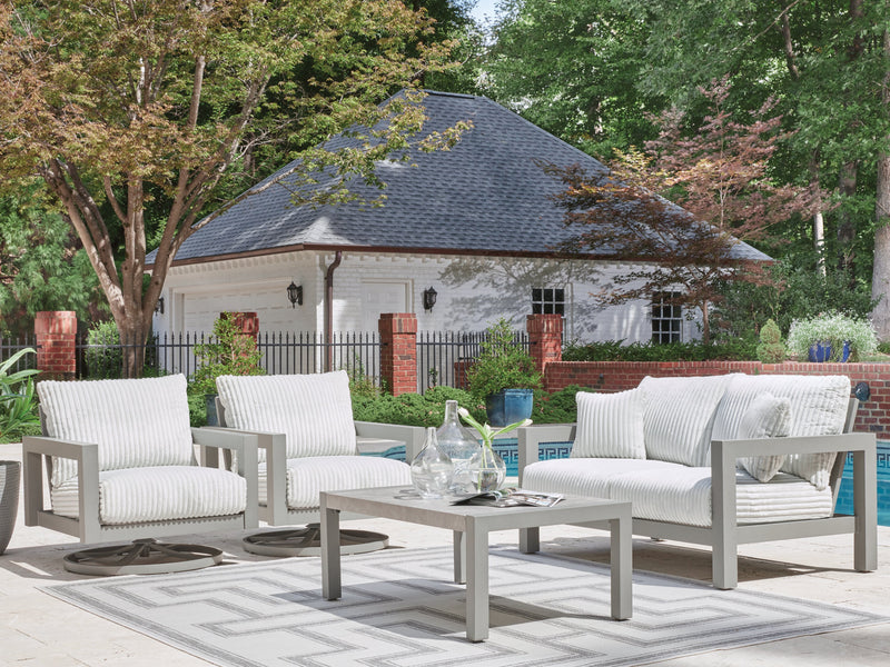 Ashley Furniture Hurley Park outdoor table set with a sturdy table and matching chairs, ideal for garden or patio use
