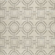 Large Maconville rug by Ashley Furniture with intricate pattern in neutral tones, ideal for living room or bedroom decor.