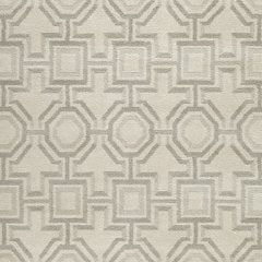 Large Maconville rug by Ashley Furniture with intricate pattern in neutral tones, ideal for living room or bedroom decor.
