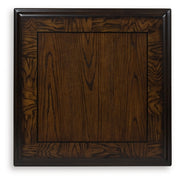 Ashley Furniture Maylee End Table with wood top and sleek black finish, featuring a modern design and sturdy legs.