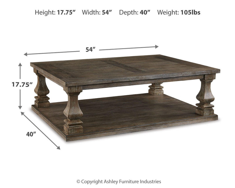 Ashley Furniture Johnelle occasional table set with two wooden tables featuring sleek, modern designs and warm wood finishes.