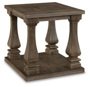 Ashley Furniture Johnelle Occasional Table Set with three stylish tables, featuring sleek wooden surfaces and modern design.