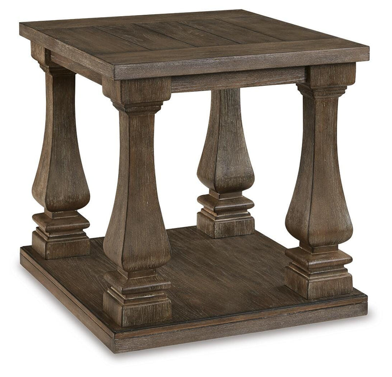 Ashley Furniture Johnelle Occasional Table Set with three stylish tables, featuring sleek wooden surfaces and modern design.