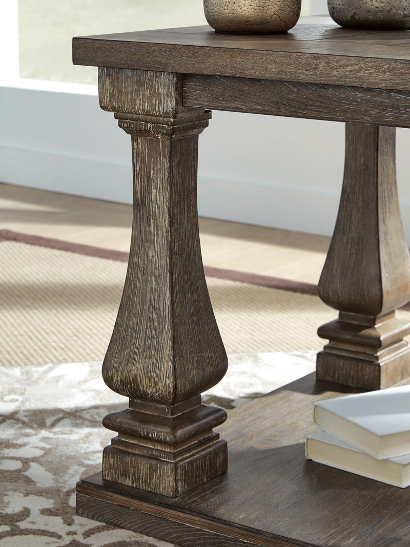 Ashley Furniture Johnelle Occasional Table Set with detailed wooden finish and modern design, featuring three matching tables.