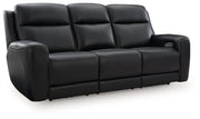 Ashley Furniture 5Z-Comfort Power Reclining Sofa shown in a closed position, featuring plush cushions and dark upholstery.