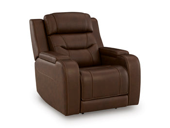Ashley Furniture Knightington power recliner with audio seating, shown from an angled view, featuring plush upholstery and built-in audio system.